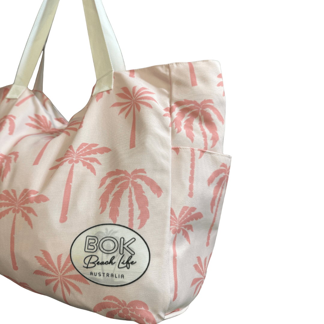 Transmutation - Bag beach Blushing Palm design is pink palm trees made out of rPET material.