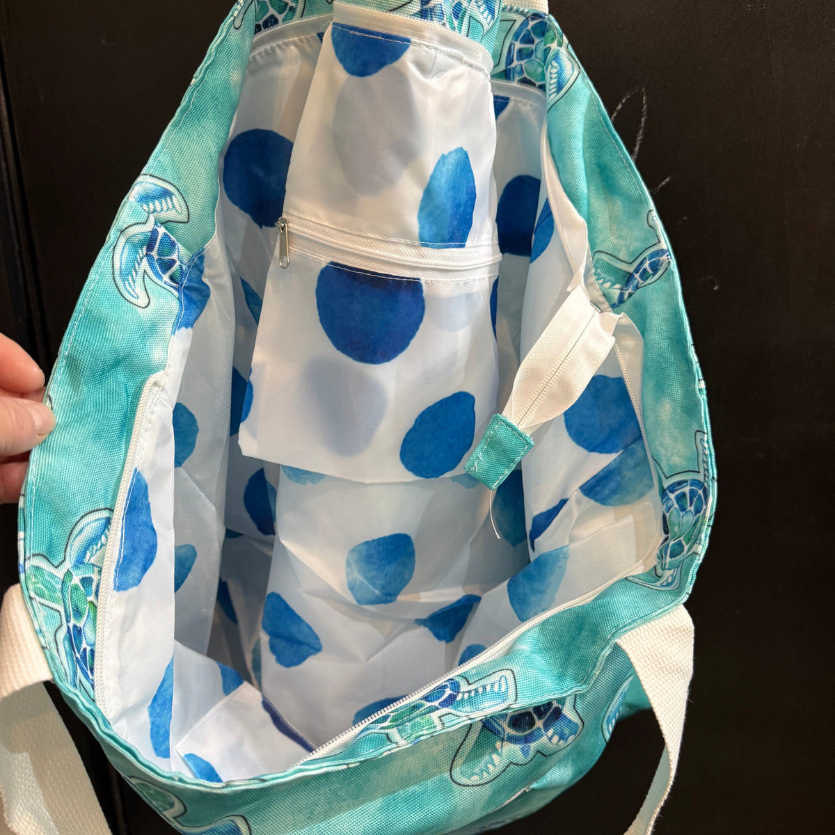 Transmutation - Beach Bag made from bottles and inside lining includes a zippered pocket. Turtle design in aqua.