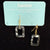 Transmutation - Earrings in the shape of a window but the colourings of a birthday cake. Made from recycled plastic.