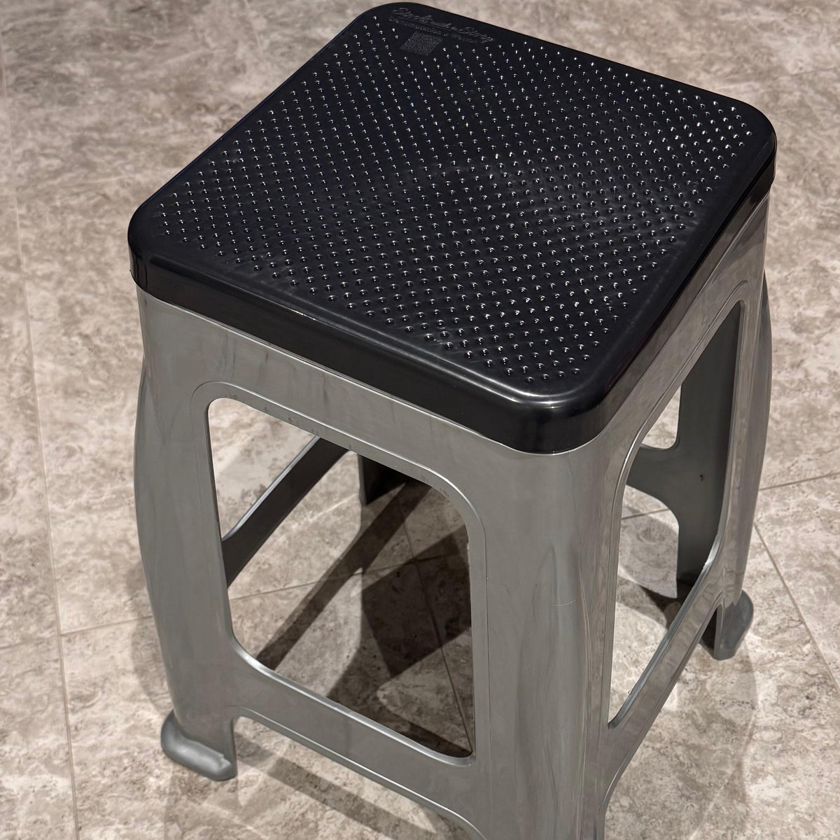 Transmutation - Stool with a story - Is made from recycled metallic lining from a chip packet and PostPrime®️ resin.