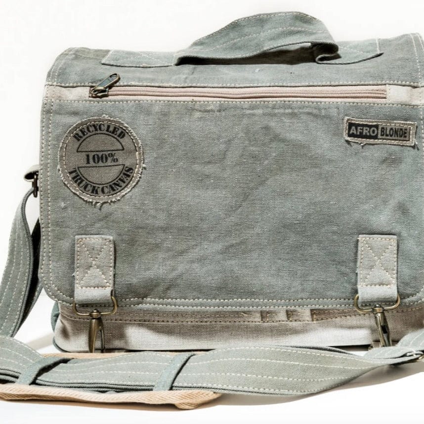 Made from recycled  green truck canvas. AfroBlonde Bag - Outpost Messenger bag has a sturdy shoulder strap and will fit your Laptop.Transmutaton