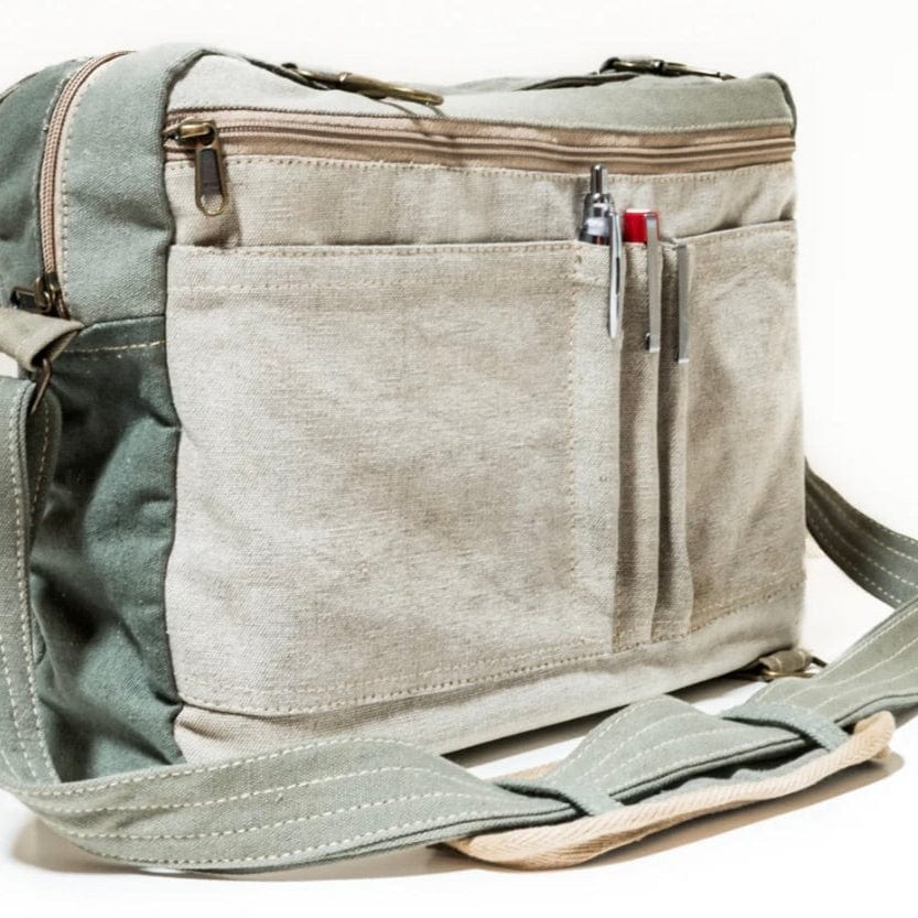 Transmutation - AfroBlonde- Outpost Messenger bag with shoulder strap is made from recycled truck canvas. Has lots of compartments with zips and will fit a laptop. Unisex design.