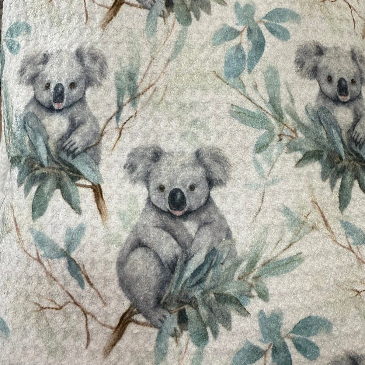 Transmutation - Handy towel with a koala design are made from recycled PET plastic bottles.