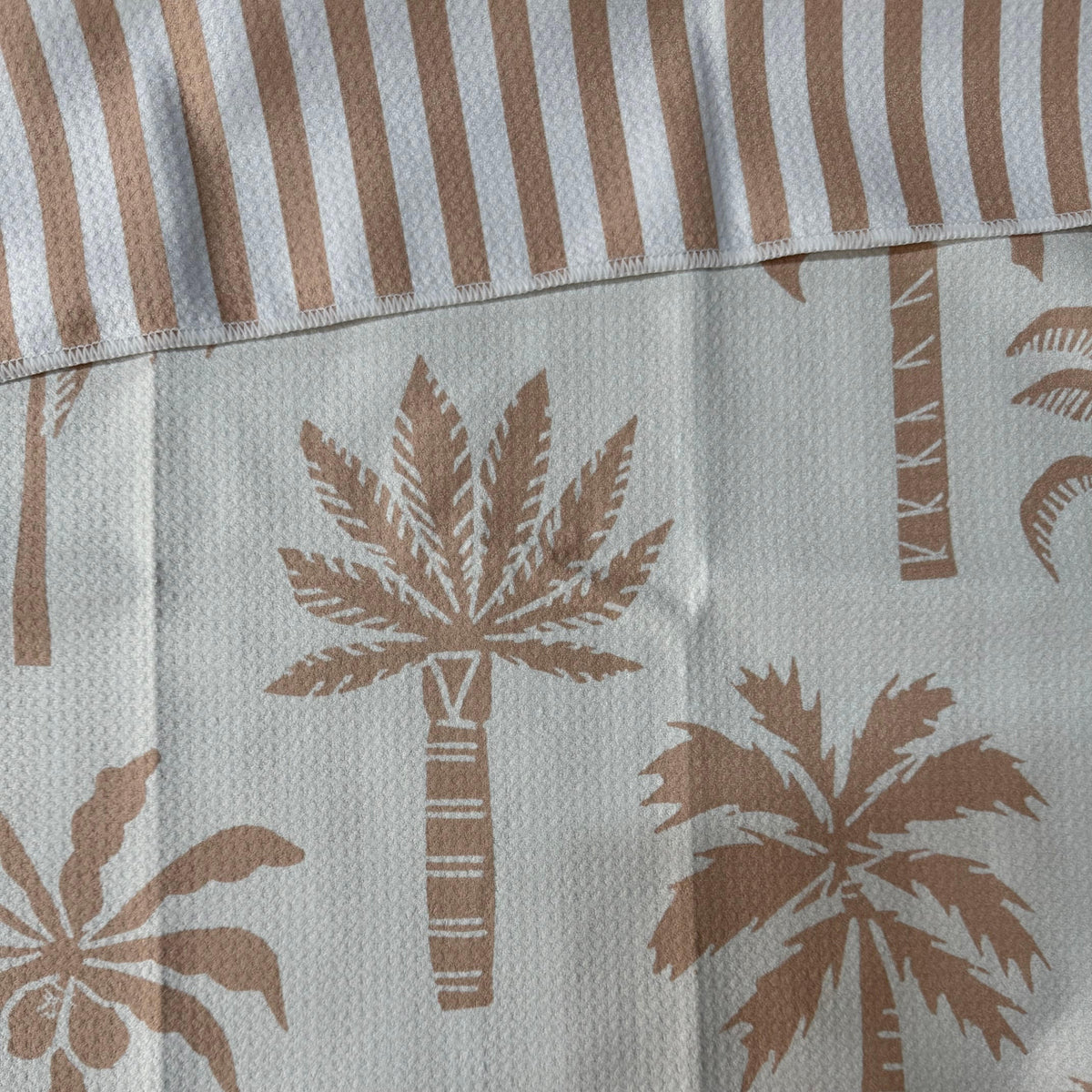 Transmutation -  Handy Towel By The Bay The eco towel designed by Bok Beach life, has multiple uses, measuring 50cm x 70cm - Recycled bottles (rPET)