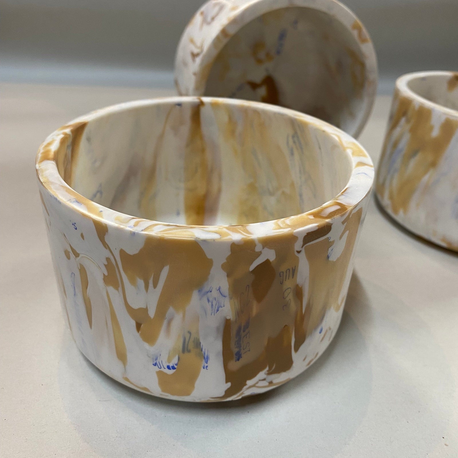 Transmutation small bowl made from 930 brown and white used plastic bread tags.