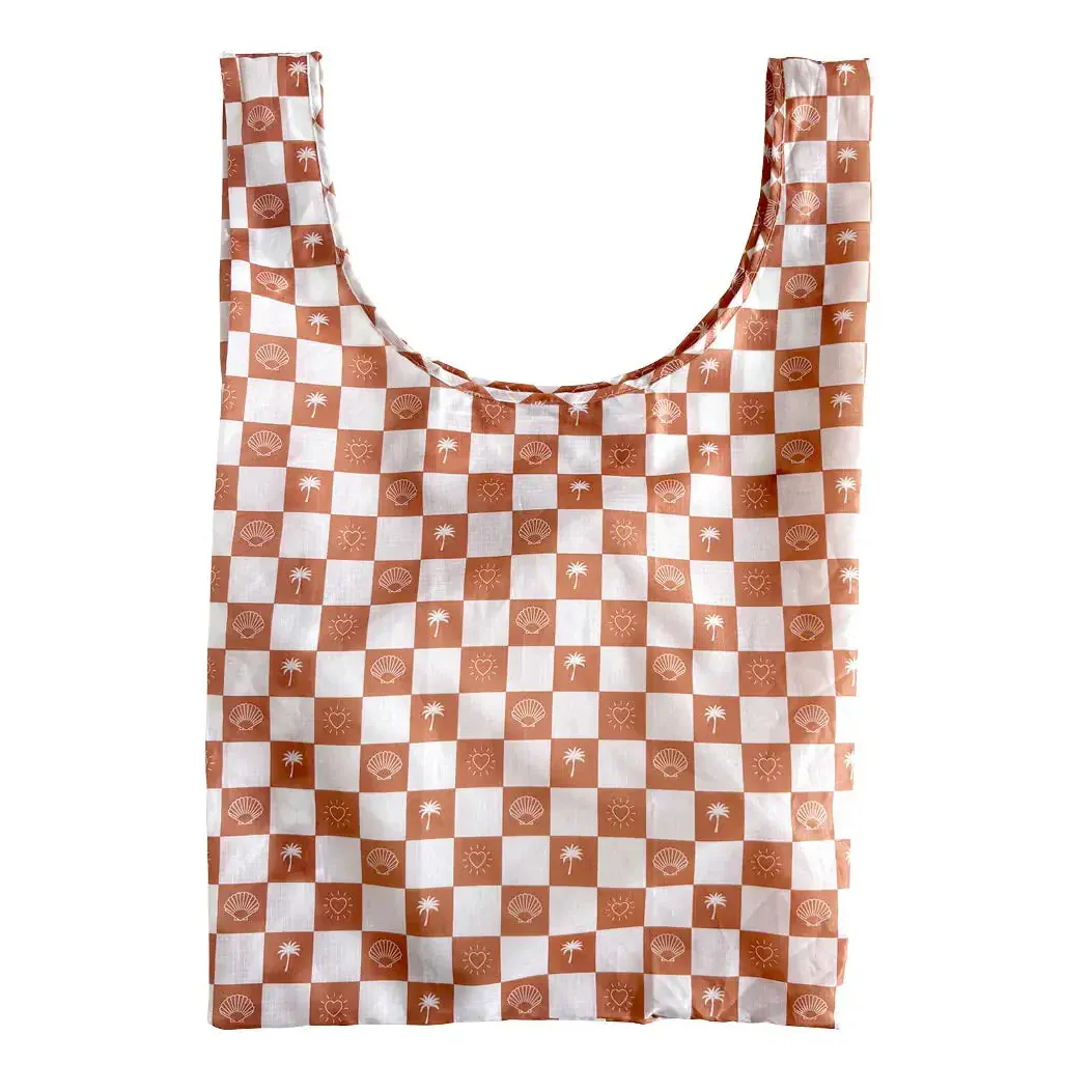 Transmutation a tote bag unfolded and made from rPET with Palm trees hearts & shells in its design.