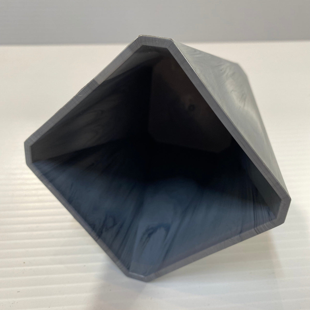 Transmutation - Multi purpose pot. Recycled Plastic and grey in colour.