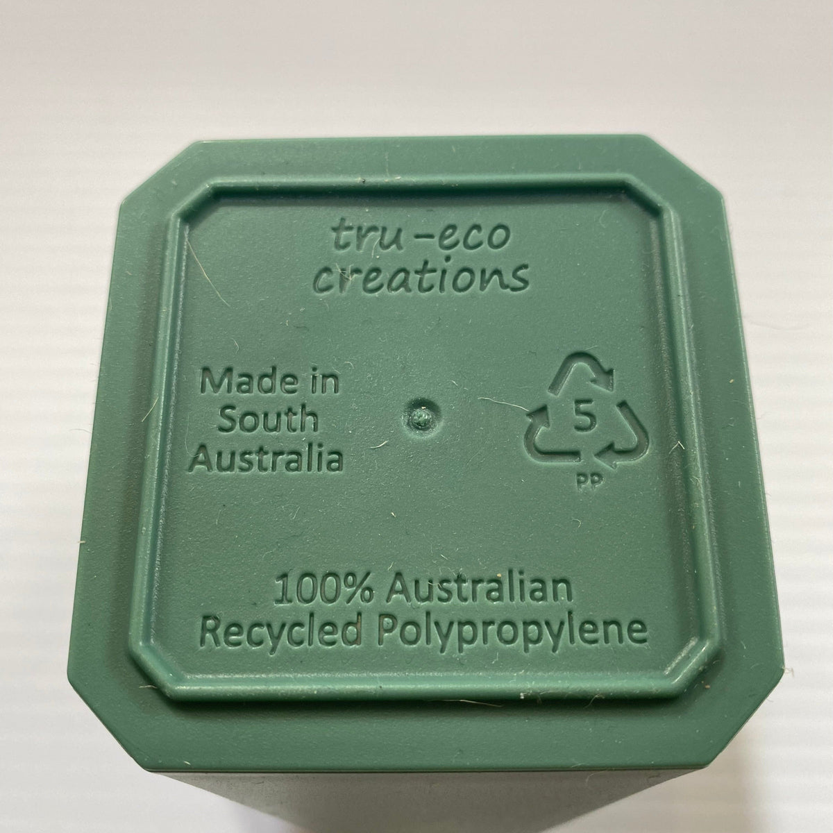 Transmutation - recycled plastic pots for multiple uses.