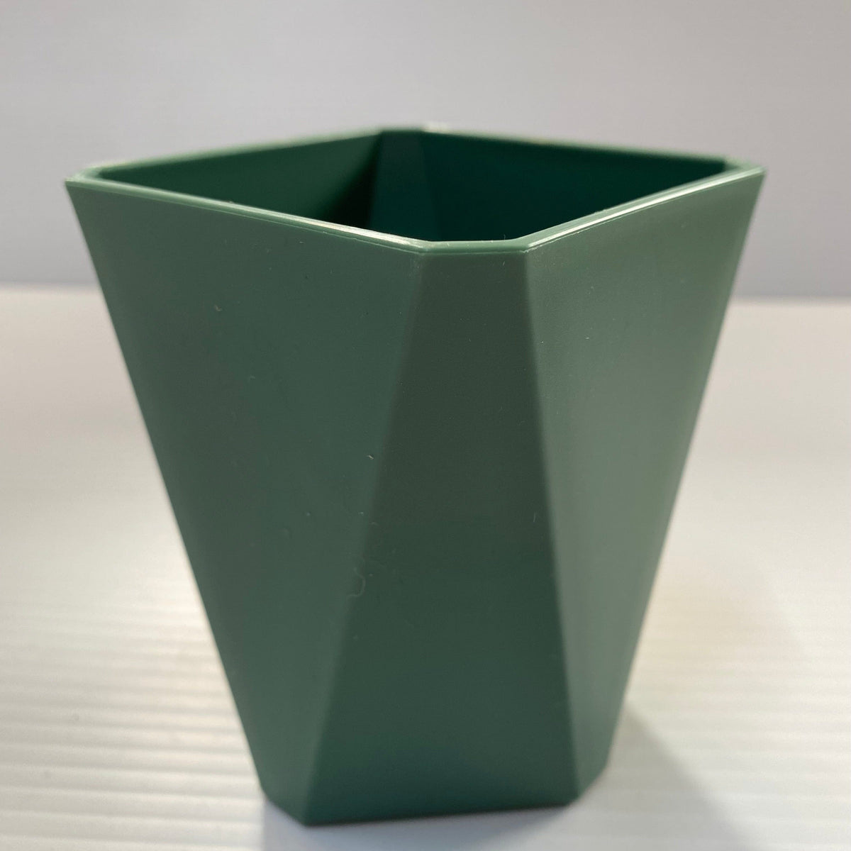 Transmutation - Pot made from recycled plastic and coloured sage.